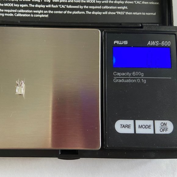 1/5 CT Emerald Cut Diamond Solitaire Pendant 14K. - Picture 6 of 12